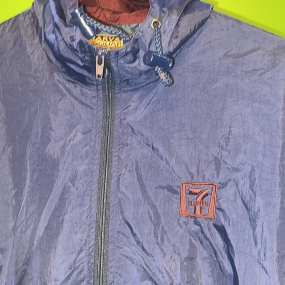 7/11 windbreaker Blue Jacket great for wind and mild rain nwot size large